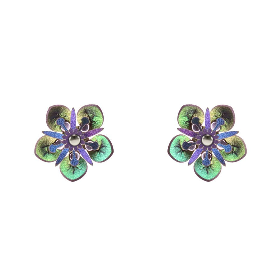 Small faux leather flower earrings with a green iridescent finish shown on a white background