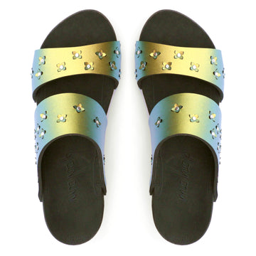 Top view of sandals in iridescent gold with tiny laser cut flowers sprinkled on the upper