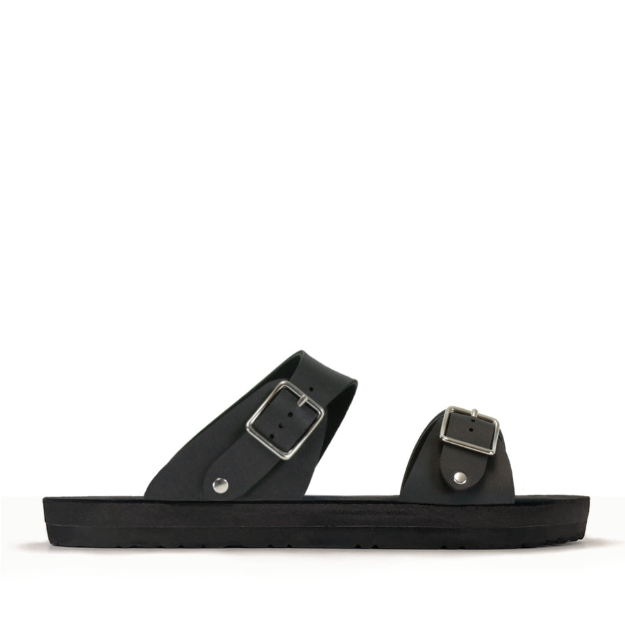 Side view of a flat, padded vegan sandal in matte black