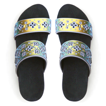 Top view of a sandal with laser cut uppers in light blue, silver, and scarab