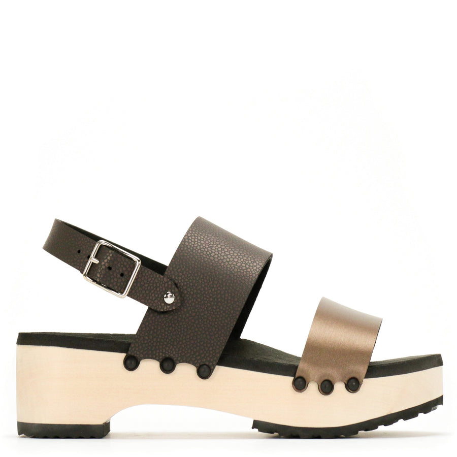 Side view of sandals with a deep tan front strap and brown back strap