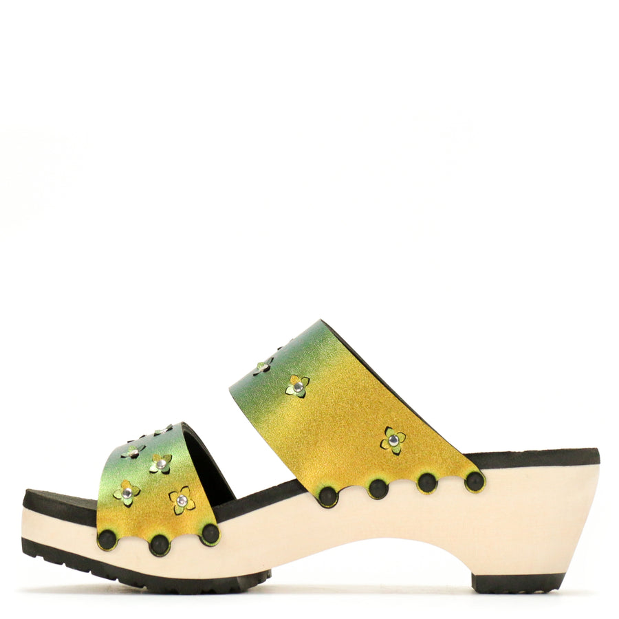Inside view of sandals in iridescent gold with tiny laser cut flowers sprinkled on the upper