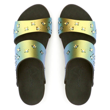Top view of sandals in iridescent gold with tiny laser cut flowers sprinkled on the upper