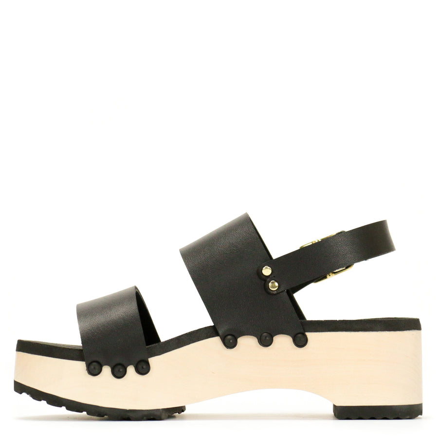 Inside view of a sandal with wide chunky straps in matte black