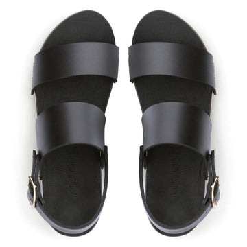 Top view of a sandal with wide chunky straps in matte black