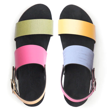 Top view of sandals with colorblock straps in pink, yellow, green and light blue