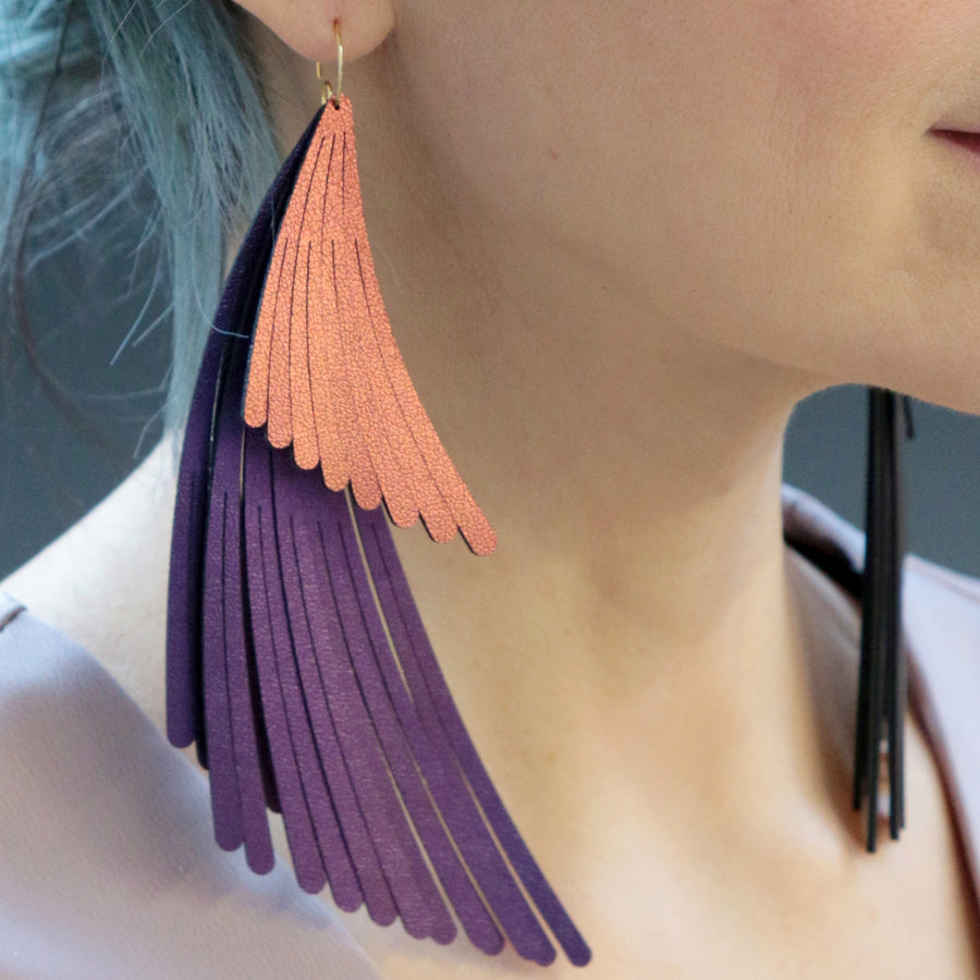 Two tier wing fringe earrings. Made in Chicago using amethyst and ruby iridescent vegan leather.