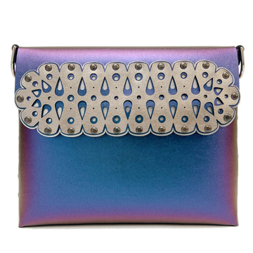 A front shot of a square crossbody bag in iridescent blue vegan faux leather with a laser cut front